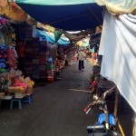 A market near the border, where Tu gets a nice blue cap!