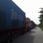 A long line of trucks queuing to enter Cambodia.